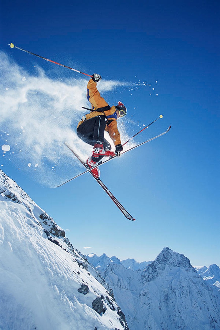 Male skier in midair