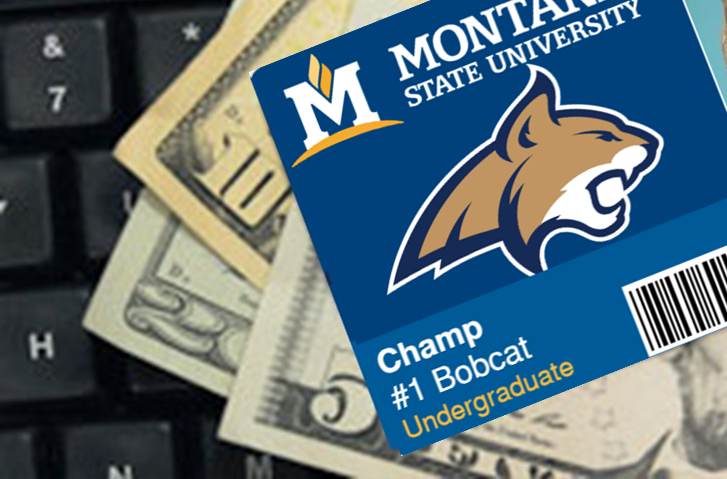 CatCard laid atop dollar bills atop a keyboad