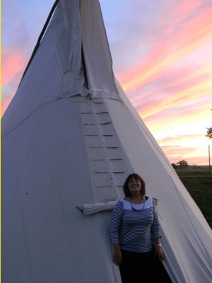 Nurse in front of Tepee