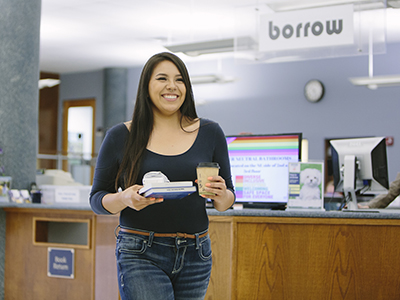 Indigenous Montana State University Student at the Library - General Scholarships