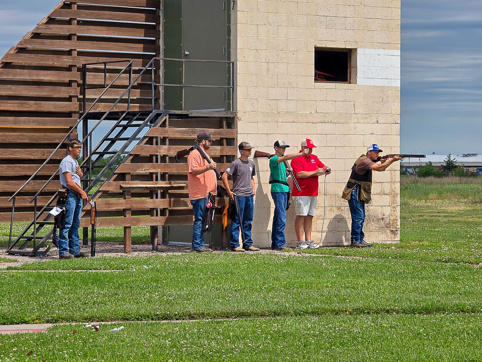 group of men shooting