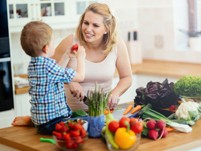 Mom and son prepping healthy foods