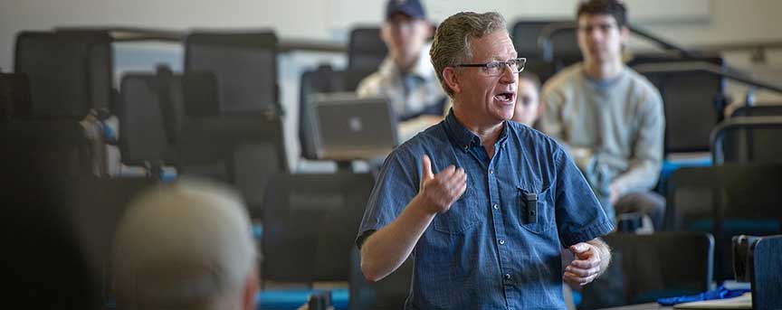 Professor teaching in a classroom