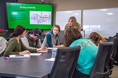 Image of faculty and students in the classroom