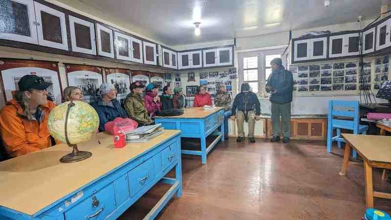 The group meets with the school principal.