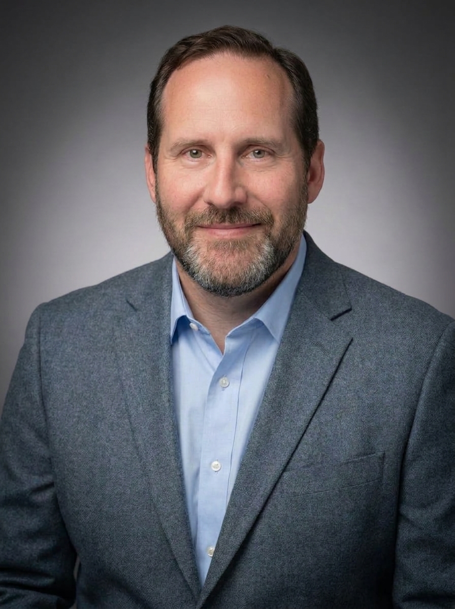 Profile headshot picture of Dr. Eric Raile